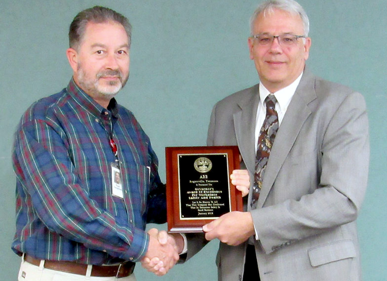 Tom Flanagan presents award to Tom Carpenter